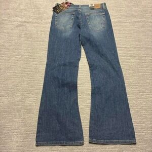 Levi's 519 y2k 2000s dark wash denim low rise relaxed flared bootcut grunge